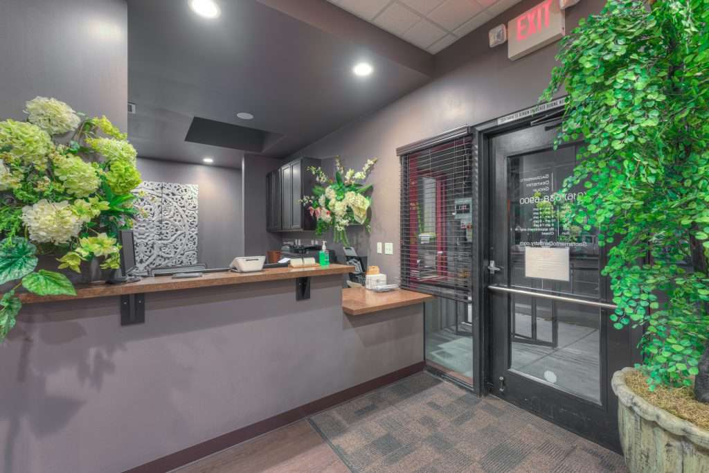 Front desk and patient check-in area at Sacramento Dentistry Group
